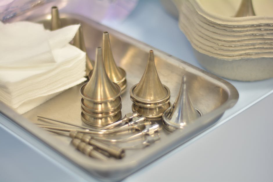 Medical and forensic supplies arranged on a tray during sexual assault acute care including swabs and prophylaxis medications