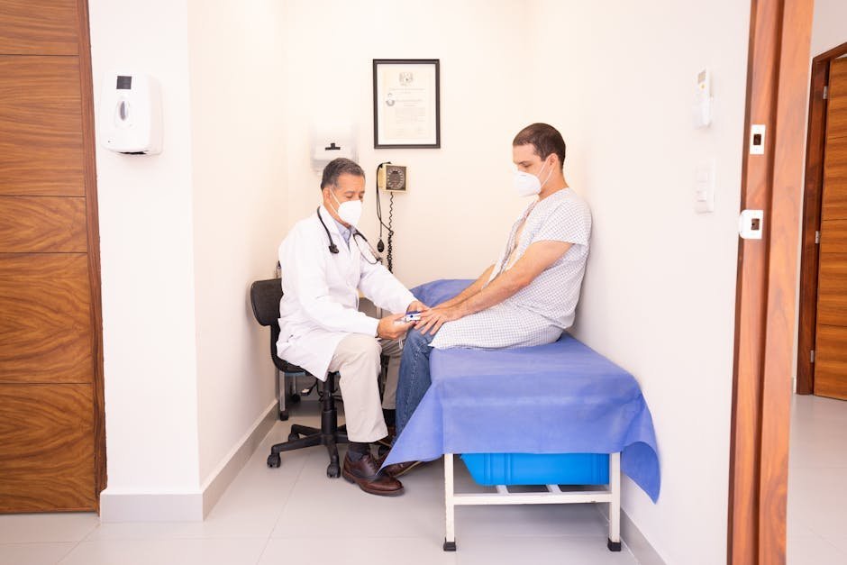 Outpatient consult room where a patient discusses post-stimulant psychosis recovery with a clinician