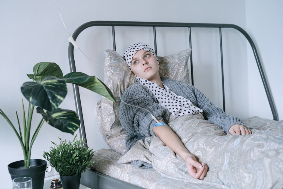 Young adult cancer survivor in fertility counseling consultation with oncofertility specialist