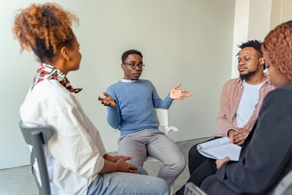 Multidisciplinary mental health team meeting at academic medical center with psychiatrist psychologist and neuropsychologist