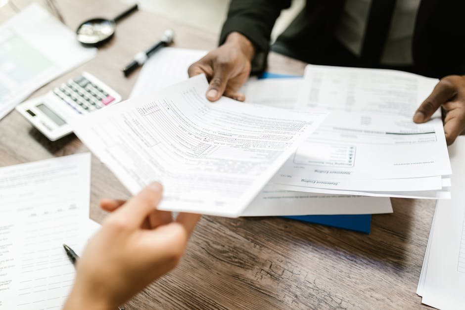 Hospital financial counselor reviewing payment plan options with patient