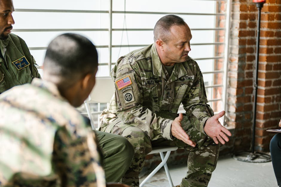 Group of veterans in peer support meeting at transitional housing program