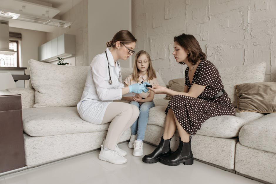 Family member and patient meeting with home hospital therapist in living room