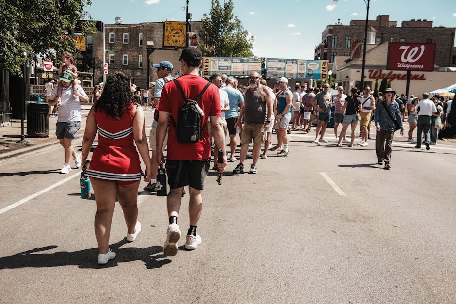 A group of people on a community walking event led by a doctor through a city park