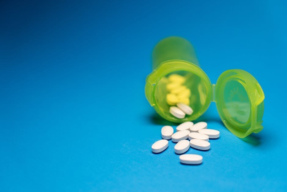 VMAT2 inhibitor medication bottle and prescription pad