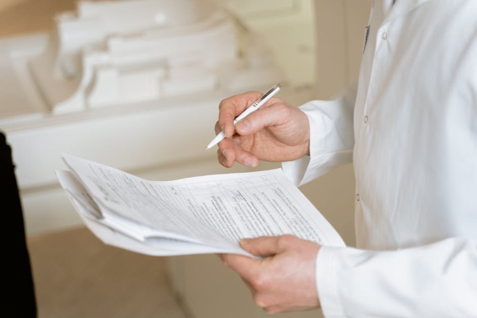 Clinician reviewing the Janssen Spravato REMS locator on a tablet to verify certification status
