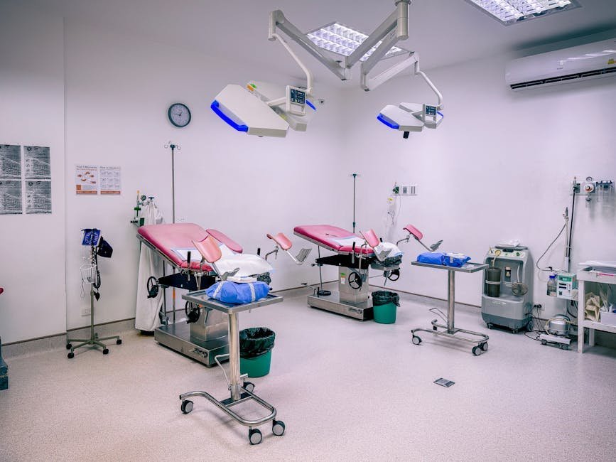 Hospital room set up with adult bed and bassinet for joint mother baby admission