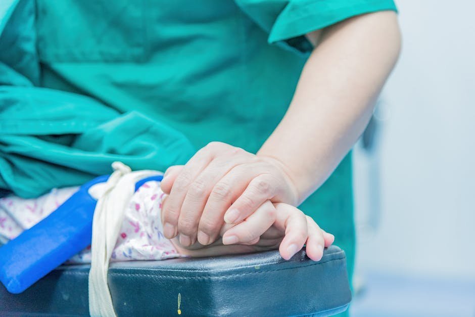 Parent holding hand of refeeding patient as nurse delivers thiamine and electrolyte replacement IV