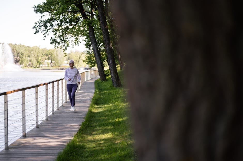 Person walking outdoors in sunshine for vitamin D synthesis through skin