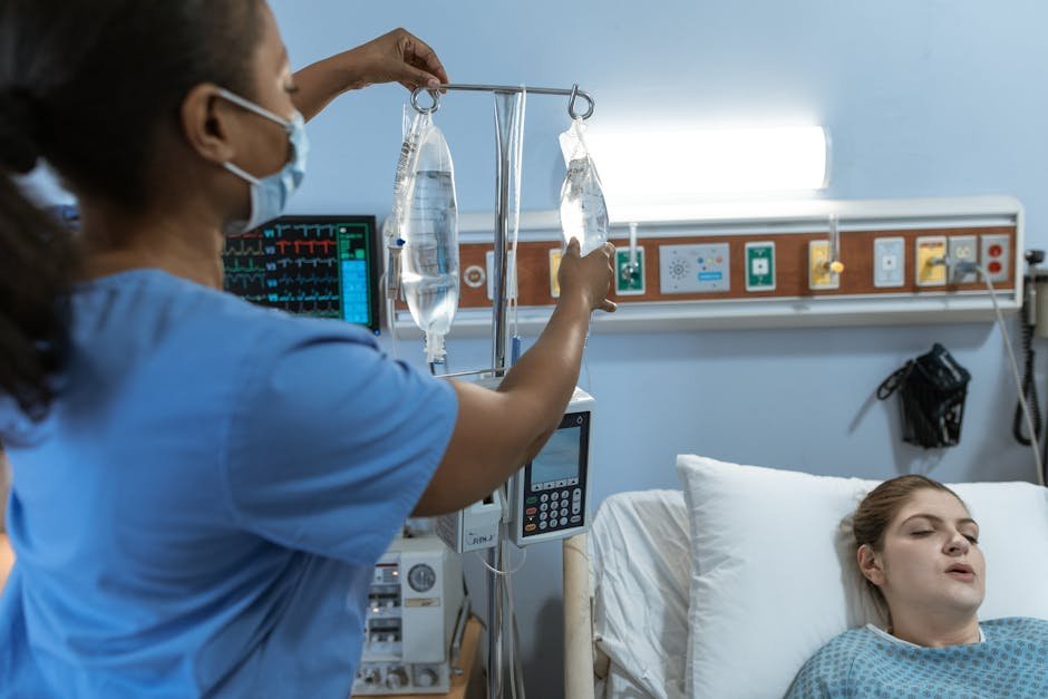 ER nurse administering intravenous benzodiazepine for sympathomimetic toxicity in young adult