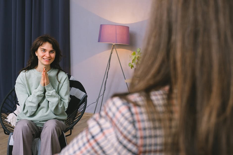 Peer recovery specialist consulting with overdose patient in emergency department private room